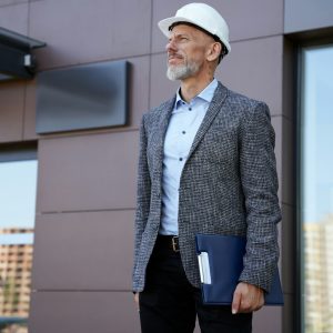 monitoring-the-progress-focused-middle-aged-architect-engineer-manager-wearing-helmet-looking.jpg monitoring-the-progress-focused-middle-aged-architect-engineer-manager-wearing-helmet-looking.jpg
